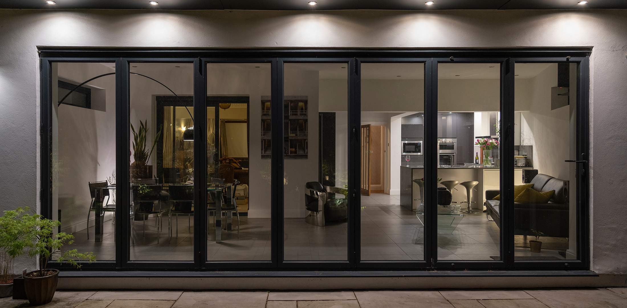 Folding glass doors and shower enclosure detail